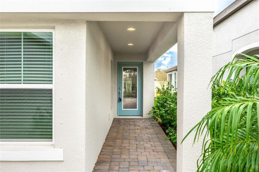 Exterior details and patio area of a home in Crosswind Point, Parrish (Image 27).