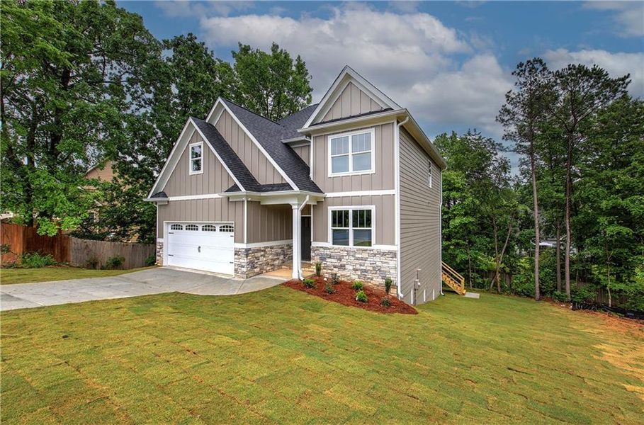 Front exterior of a new home in , Adairsville, GA, highlighting curb appeal (Image 21).