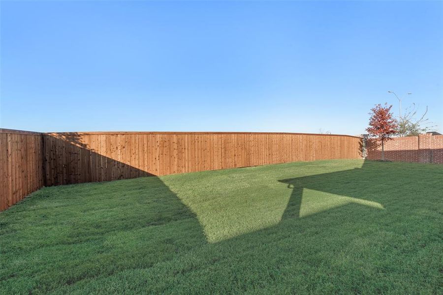 Exterior details and patio area of a home in Wildflower Ranch, Justin (Image 22). Exterior details and patio area of a home in Wildflower Ranch, Justin (Image 22).