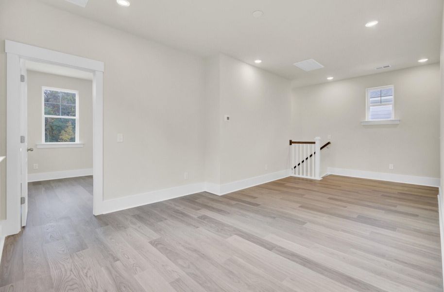 Spacious, unfurnished interior of a new home in Indigo Grove Single Family Homes, Johns Island (Image 36).