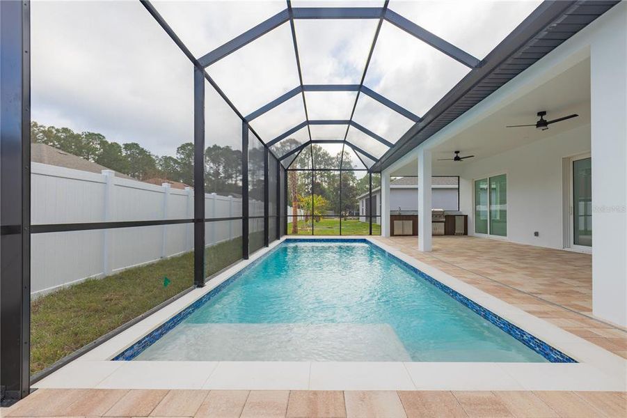Exterior details and patio area of a home in , Palm Coast (Image 4). Exterior details and patio area of a home in , Palm Coast (Image 4).