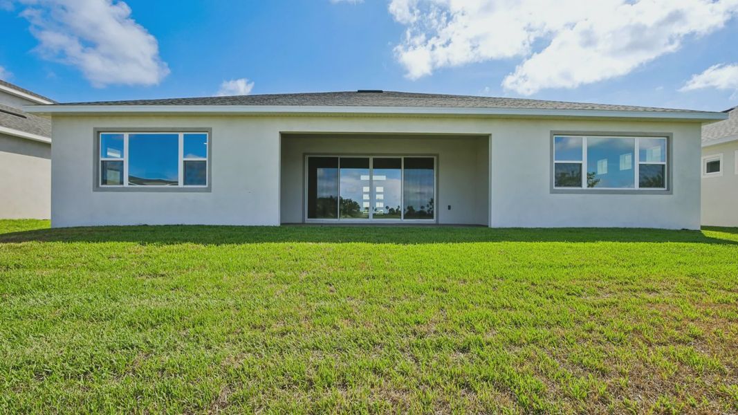 Exterior details and patio area of a home in Biscayne Landing at Seaire, Parrish (Image 3).