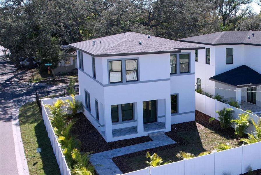 Front exterior of a new home in , St. Petersburg, FL, highlighting curb appeal (Image 33).