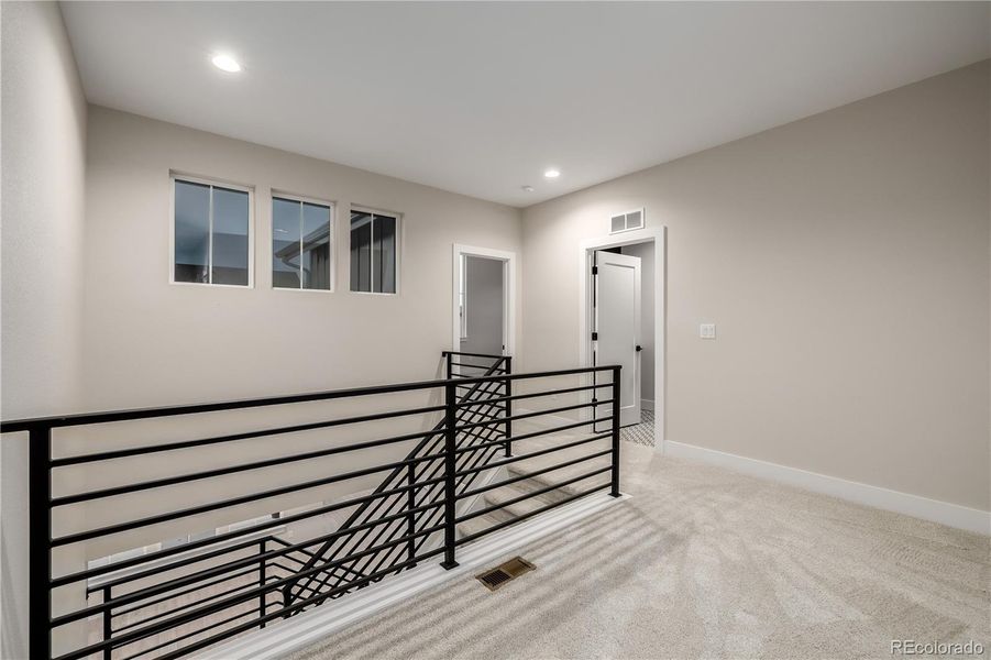 Spacious, unfurnished interior of a new home in West Grange, Longmont (Image 36).