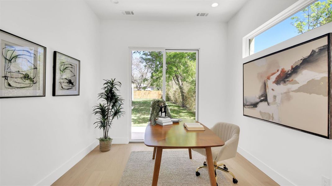 Office or 4th bedroom/guest suite featuring light wood-style floors and recessed lighting