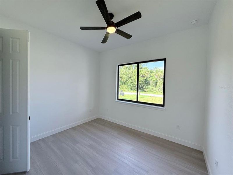 Spacious, unfurnished interior of a new home in , Port Charlotte (Image 17).