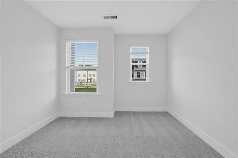 Spacious, unfurnished interior of a new home in Towns at Holly Springs, Holly Springs (Image 24).
