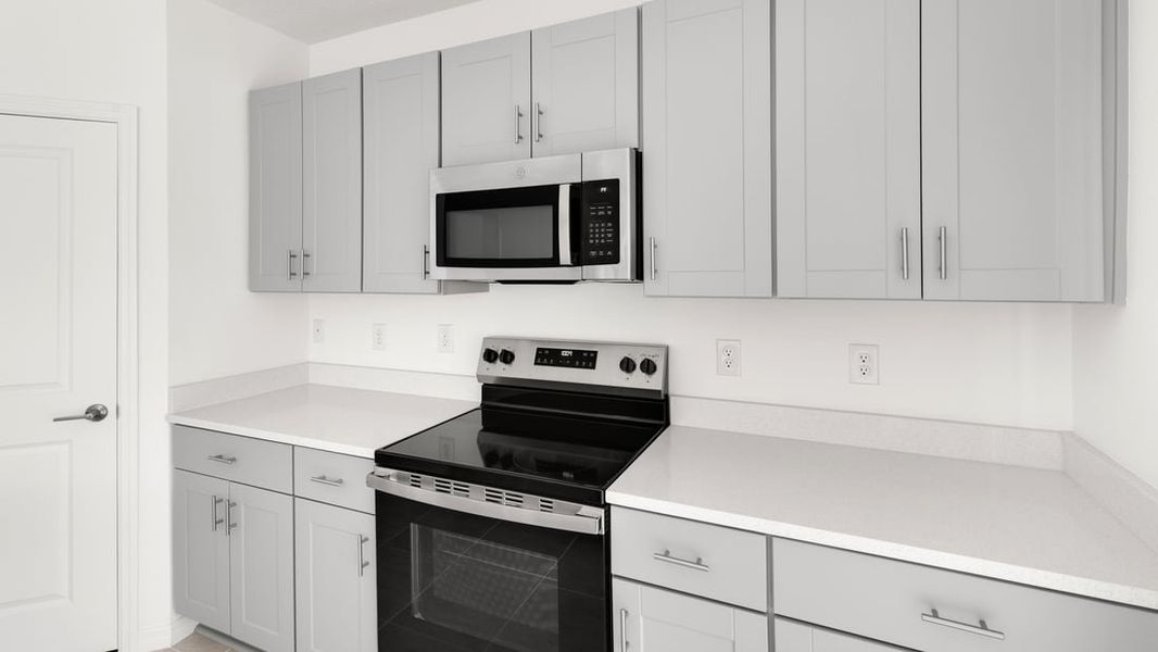 Representative furnished interior of a home built from the Ambrosia by Taylor Morrison in Aden South at Westview, Kissimmee (Image 5).
