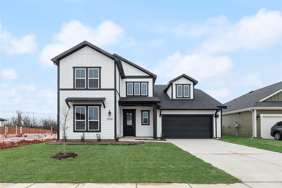 Front exterior of a new home in Creekside of Crowley, Crowley, TX, highlighting curb appeal (Image 2). Front exterior of a new home in Creekside of Crowley, Crowley, TX, highlighting curb appeal (Image 2).