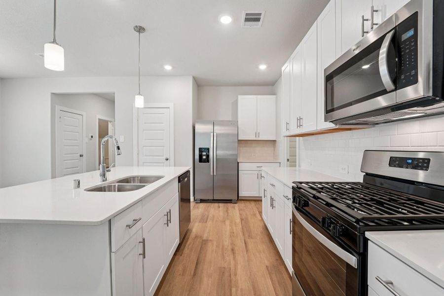 Furnished interior view inside a new home in Landing Meadows - Traditional Series, New Caney (Image 13). Furnished interior view inside a new home in Landing Meadows - Traditional Series, New Caney (Image 13).