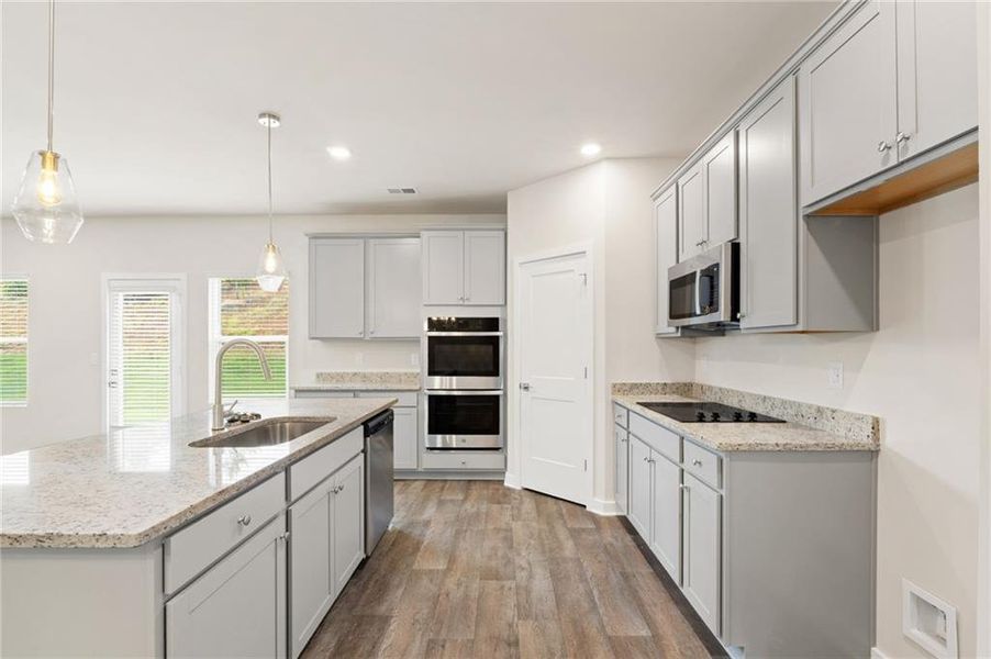Furnished interior view inside a new home in Fern Dale, Fairburn (Image 7).