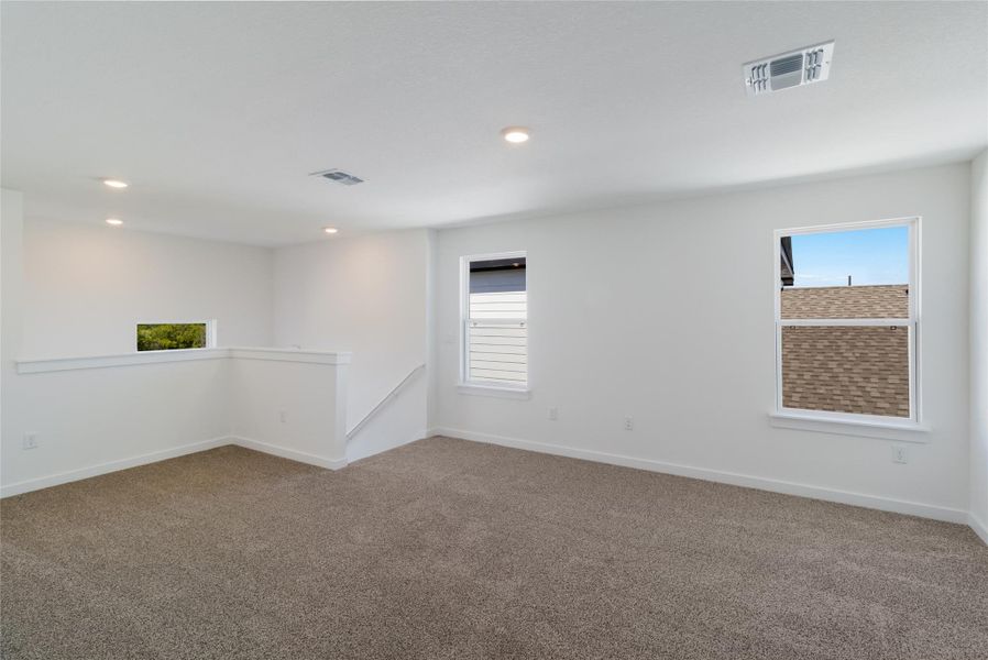 Spacious, unfurnished interior of a new home in Trails at Wildhorse, Austin (Image 11).