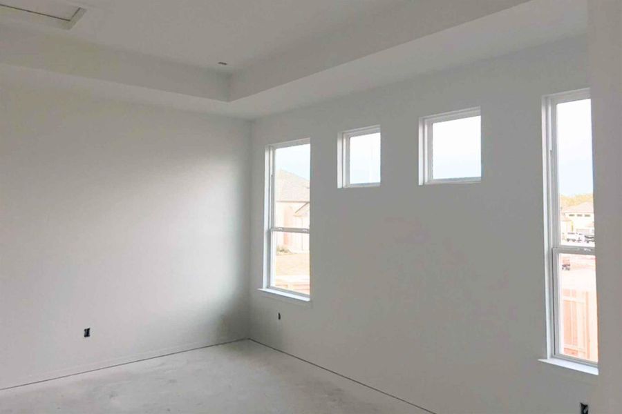 Empty room featuring concrete floors