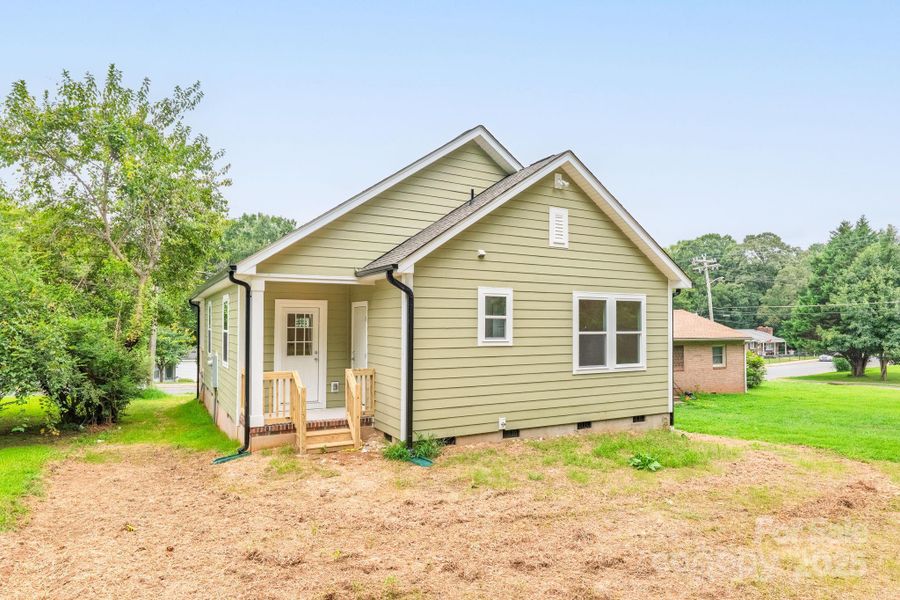 Front exterior of a new home in , Statesville, NC, highlighting curb appeal (Image 24).