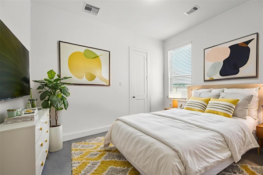 The final of the secondary bedrooms with plush neutral carpet, natural light, spacious closet, and a private vanity connecting to the jack and jill bathroom. *This photo has been virtually staged The final of the secondary bedrooms with plush neutral carpet, natural light, spacious closet, and a private vanity connecting to the jack and jill bathroom. *This photo has been virtually staged