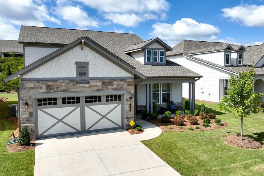 Front exterior of a new home in , Hoschton, GA, highlighting curb appeal (Image 25). Front exterior of a new home in , Hoschton, GA, highlighting curb appeal (Image 25).