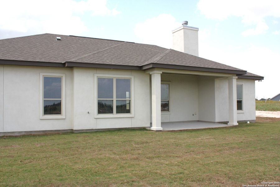 Front exterior of a new home in , La Vernia, TX, highlighting curb appeal (Image 24). Front exterior of a new home in , La Vernia, TX, highlighting curb appeal (Image 24).