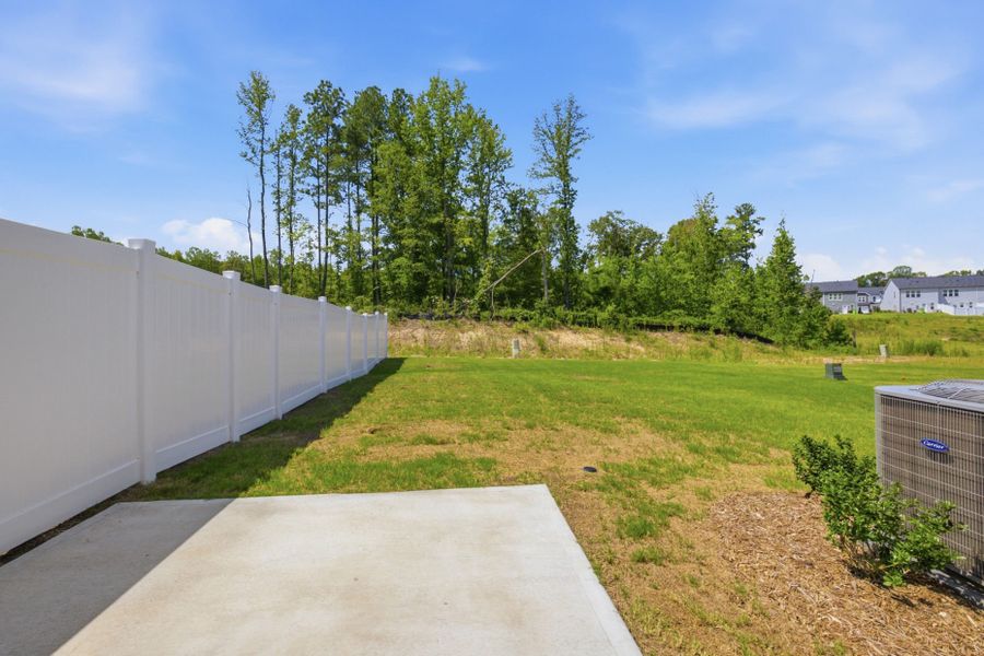 Exterior details and patio area of a home in Carpenter Falls, Durham (Image 3).