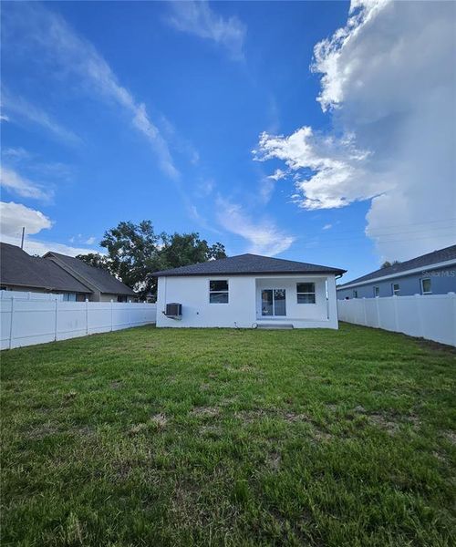 Front exterior of a new home in , Tampa, FL, highlighting curb appeal (Image 1).