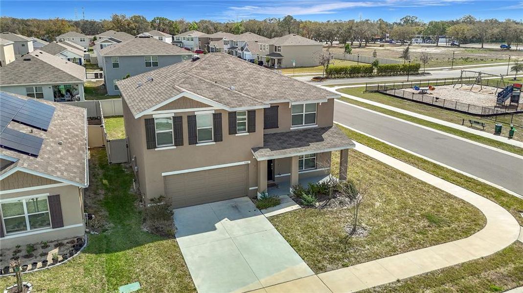 Front exterior of a new home in River Park, Temple Terrace, FL, highlighting curb appeal (Image 28). Front exterior of a new home in River Park, Temple Terrace, FL, highlighting curb appeal (Image 28).