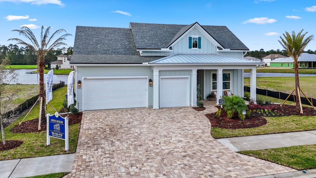Front exterior of a new home in Amelia National Country Club, Fernandina Beach, FL, highlighting curb appeal (Image 22).