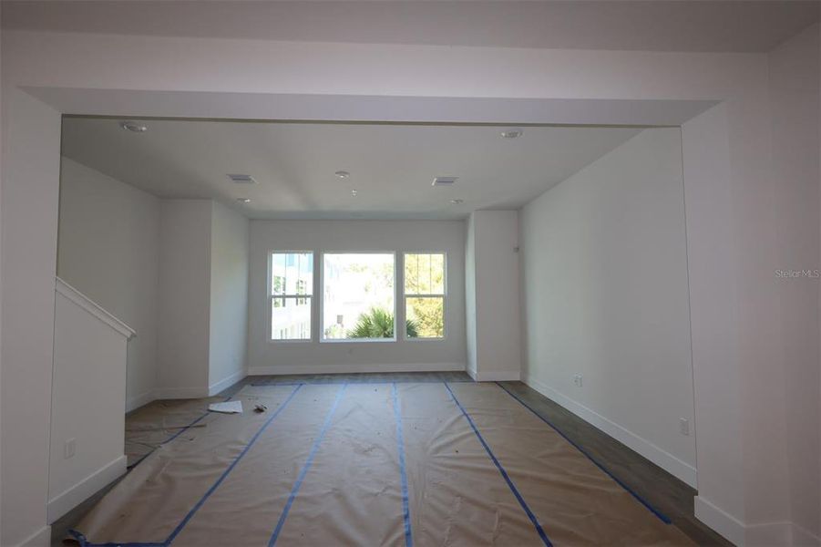 In-progress construction of a new home in Towns at Union, St. Petersburg, FL (Image 37).