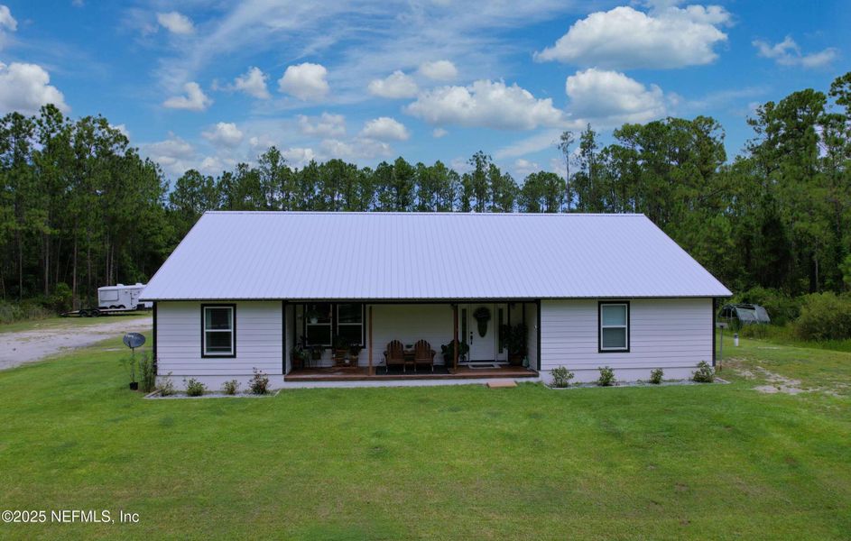 Front exterior of a new home in , Palatka, FL, highlighting curb appeal (Image 23).