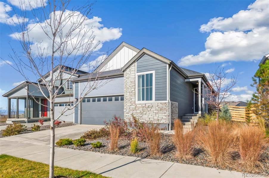 Front exterior of a new home in Legato, Commerce City, CO, highlighting curb appeal (Image 10).