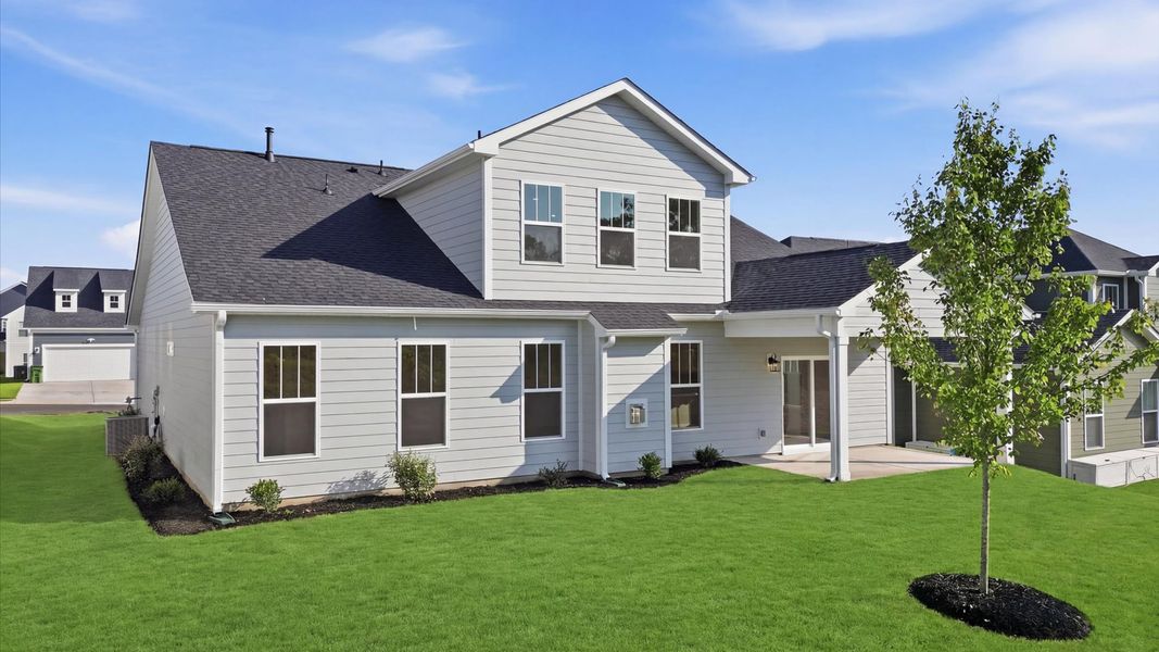 Established charm meets functional outdoor living with a spacious rear covered porch by DRB Homes