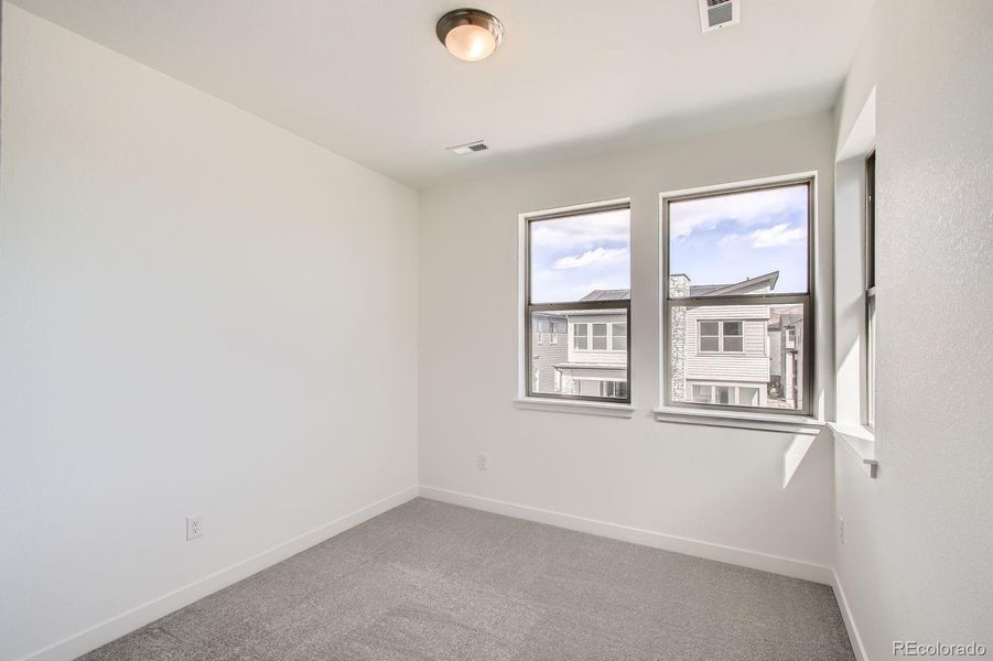 Spacious, unfurnished interior of a new home in Red Rocks Ranch: The Skyline Collection, Morrison (Image 9).