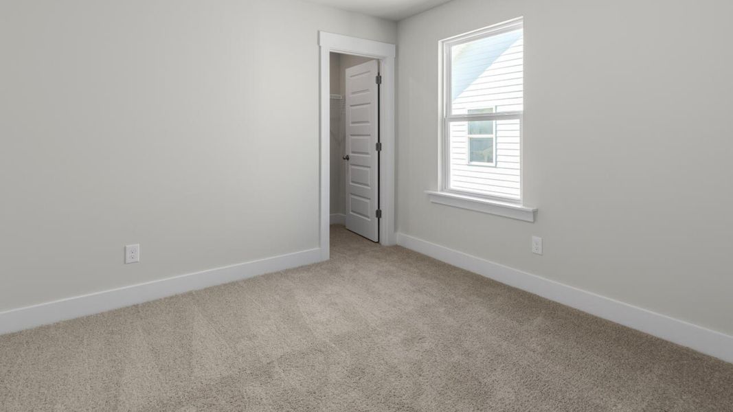 Representative unfurnished interior of a home built from the WREN by D.R. Horton in Indigo Preserve, Leland (Image 31). Representative unfurnished interior of a home built from the WREN by D.R. Horton in Indigo Preserve, Leland (Image 31).