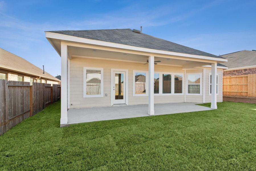 Exterior details and patio area of a home in Magnolia Ridge, Magnolia (Image 4).