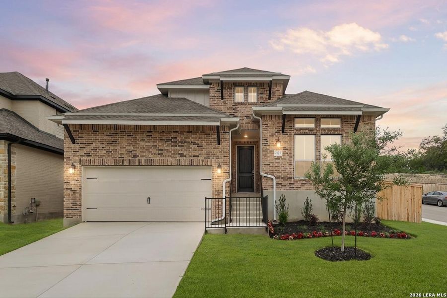 Front exterior of a new home in Ladera, San Antonio, TX, highlighting curb appeal (Image 27). Front exterior of a new home in Ladera, San Antonio, TX, highlighting curb appeal (Image 27).