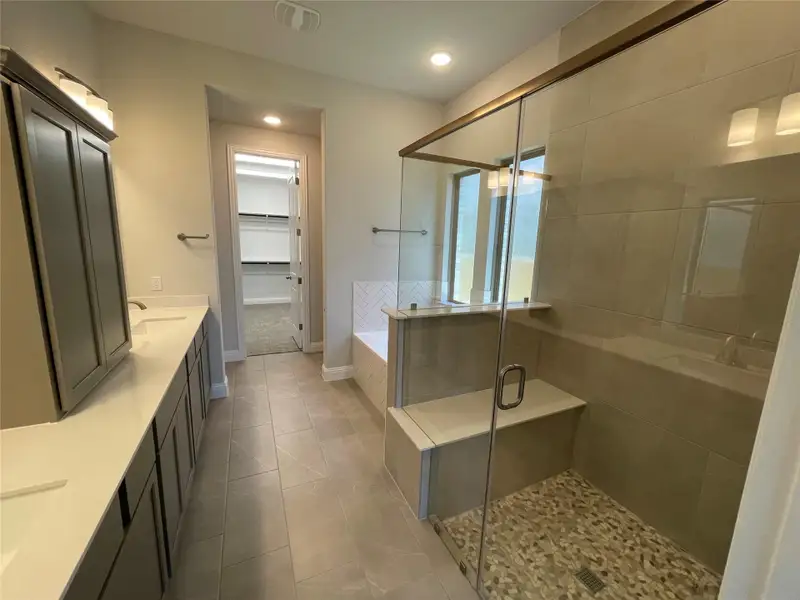 Primary Bath with dual vanities, walk-in shower & garden tub Primary Bath with dual vanities, walk-in shower & garden tub