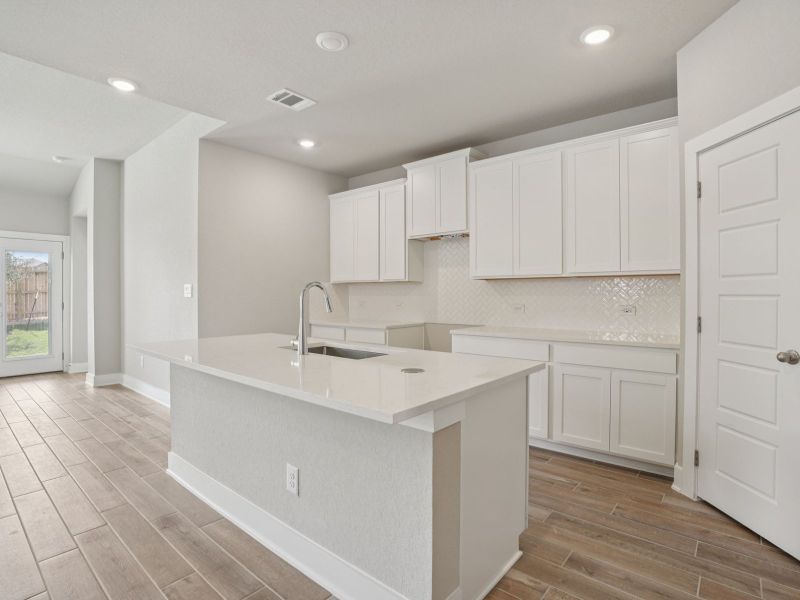 Kitchen in the San Jacinto floorplan at a Meritage Homes community. Kitchen in the San Jacinto floorplan at a Meritage Homes community.