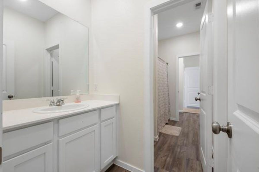 Furnished interior view inside a new home in Sterling Point at Baytown Crossings: Wildflower II Collection, Baytown (Image 12). Furnished interior view inside a new home in Sterling Point at Baytown Crossings: Wildflower II Collection, Baytown (Image 12).