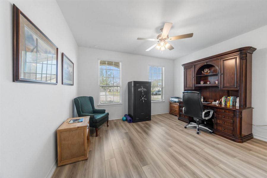 First extra bedroom is being used as an office and has ceiling fan, walk-in closet and it's own full bath.