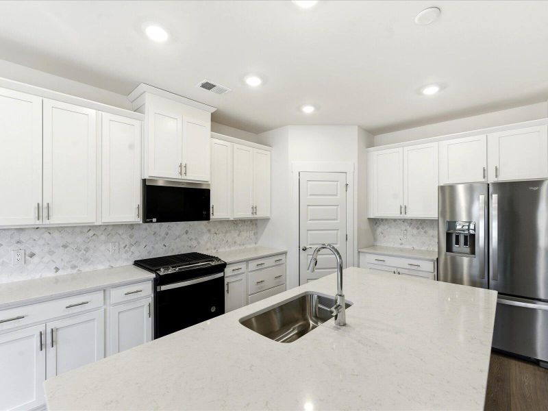 Furnished interior view inside a new home in The Coves at Lakes of Cane Bay II, Summerville (Image 13).