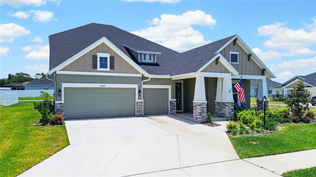 Front exterior of a new home in Carmela, San Antonio, FL, highlighting curb appeal (Image 25). Front exterior of a new home in Carmela, San Antonio, FL, highlighting curb appeal (Image 25).