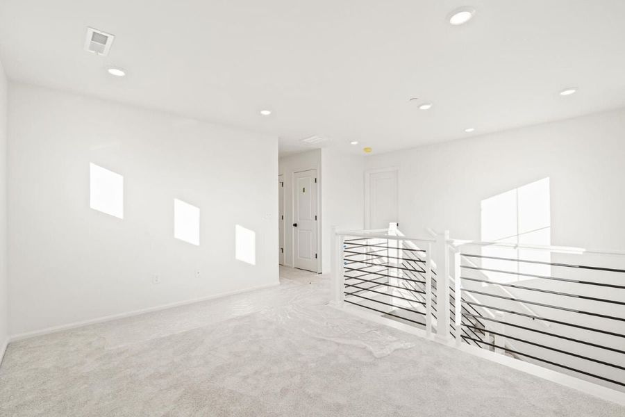 Spacious, unfurnished interior of a new home in The Nest Classic at Canyon Creek, Erie (Image 7).