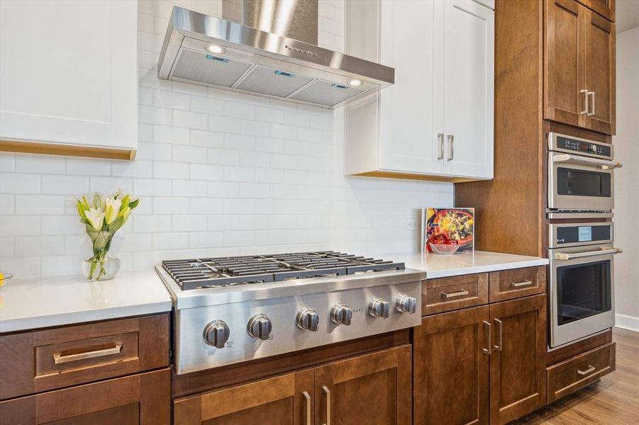 Stainless steel appliances, including an impressive stove.