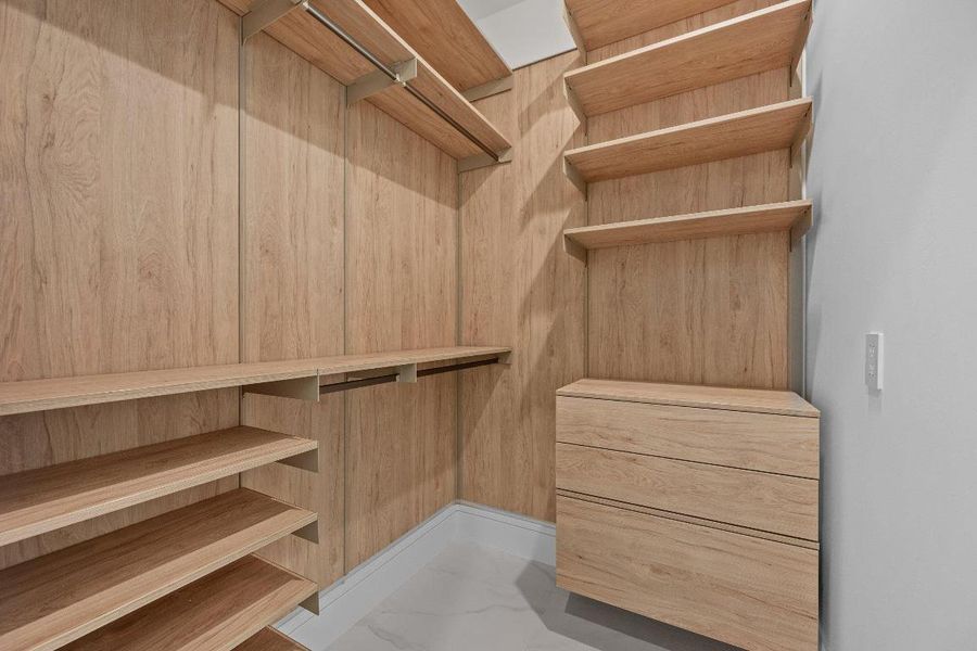 Custom Cabinetry in Master closets