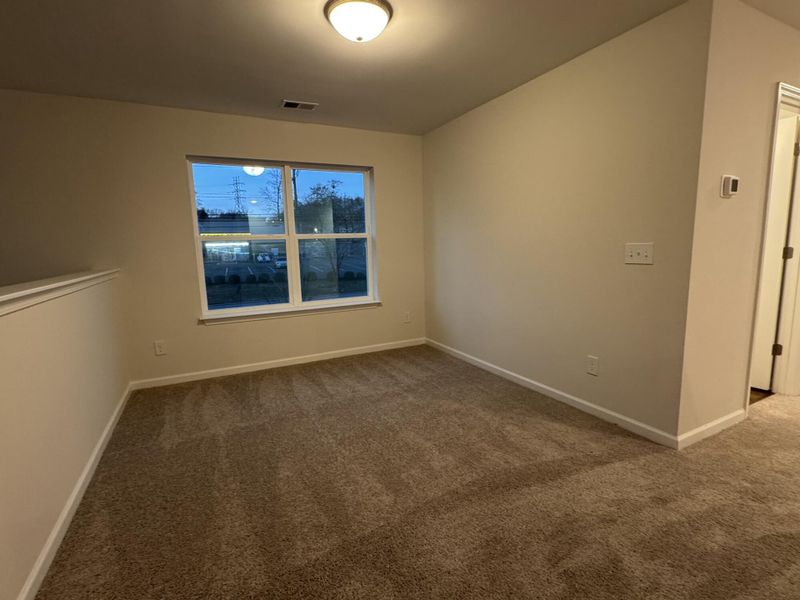 Spacious, unfurnished interior of a new home in East Main Townes, Spartanburg (Image 15).