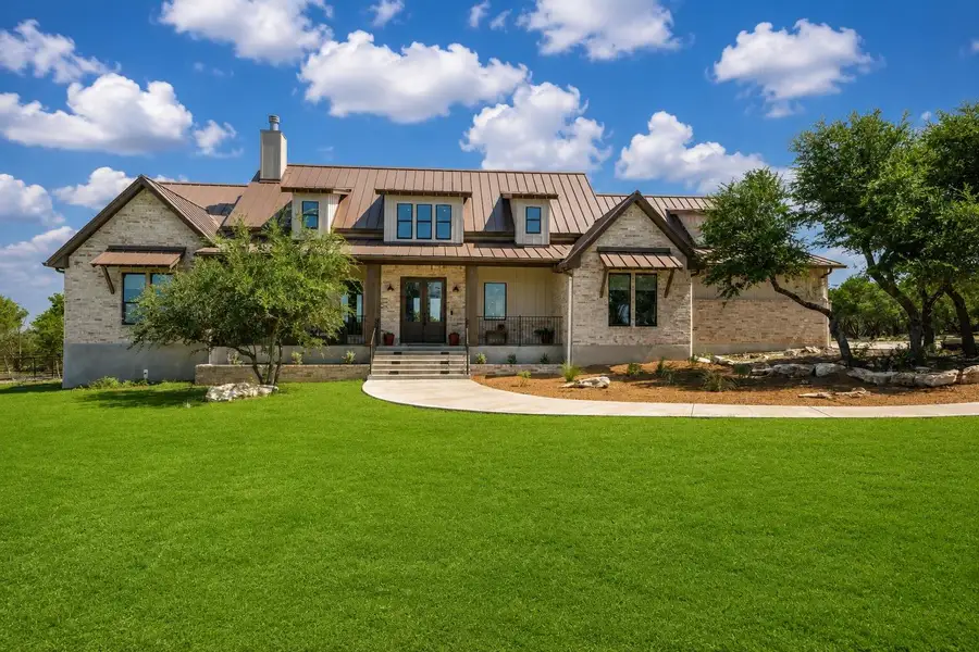 Front exterior of a new home in , Johnson City, TX, highlighting curb appeal (Image 1). Front exterior of a new home in , Johnson City, TX, highlighting curb appeal (Image 1).