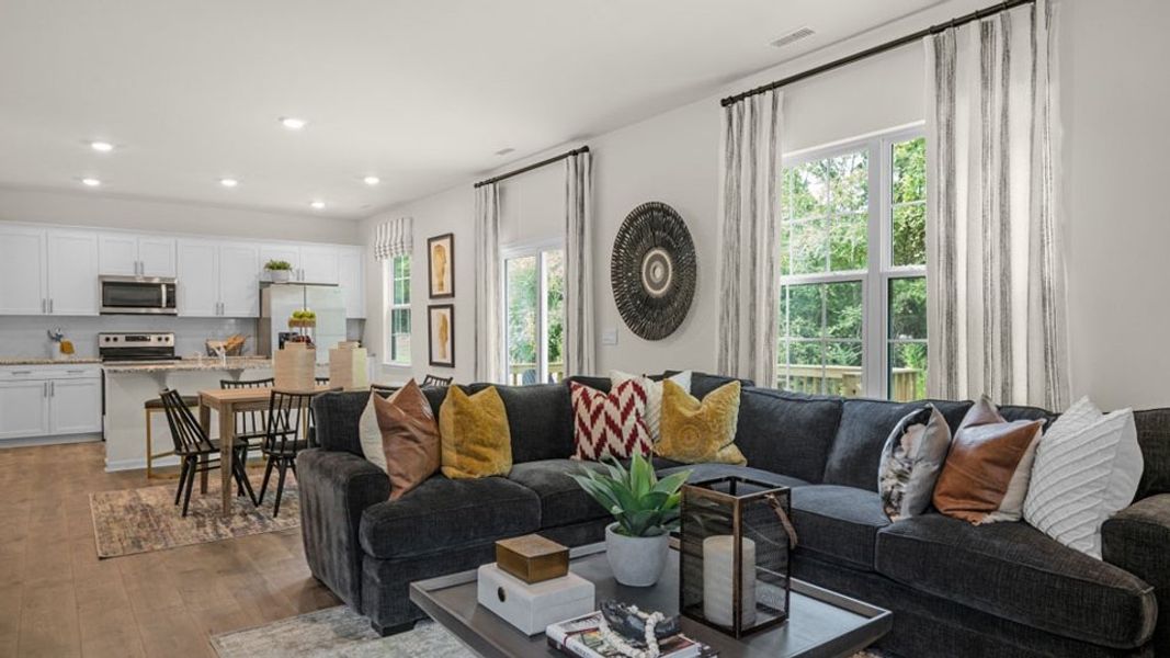 Representative furnished interior of a home built from the Penwell by D.R. Horton in The Grove at Matthews Landing, Fuquay Varina (Image 5).