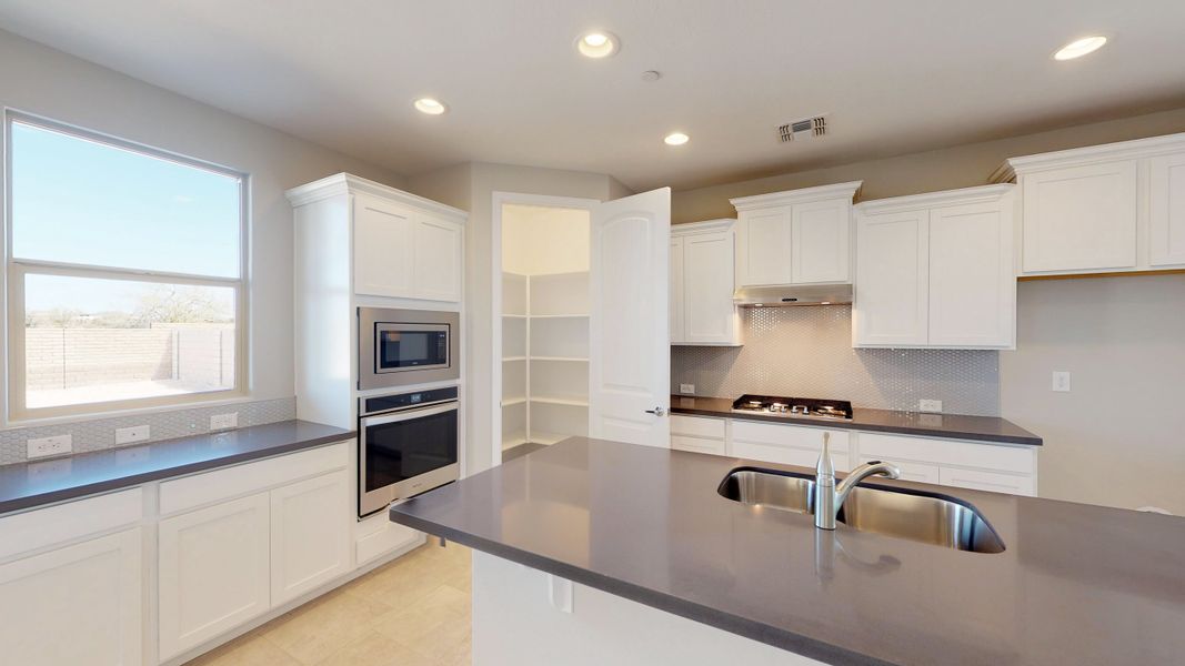 Representative furnished interior of a home built from the Castillo Series - Lavender by Brightland Homes in Castillo at Anderson Parc, Buckeye (Image 8). Representative furnished interior of a home built from the Castillo Series - Lavender by Brightland Homes in Castillo at Anderson Parc, Buckeye (Image 8).