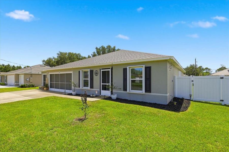 Exterior details and patio area of a home in , Palm Coast (Image 26). Exterior details and patio area of a home in , Palm Coast (Image 26).