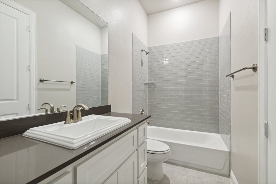 Image 8 representing the Carter by Megatel Homes in Manors at Woodbridge, Wylie, TX. Image 8 representing the Carter by Megatel Homes in Manors at Woodbridge, Wylie, TX.