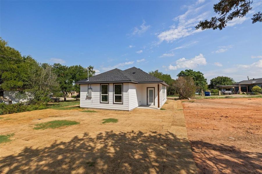 Back of property with central air condition unit