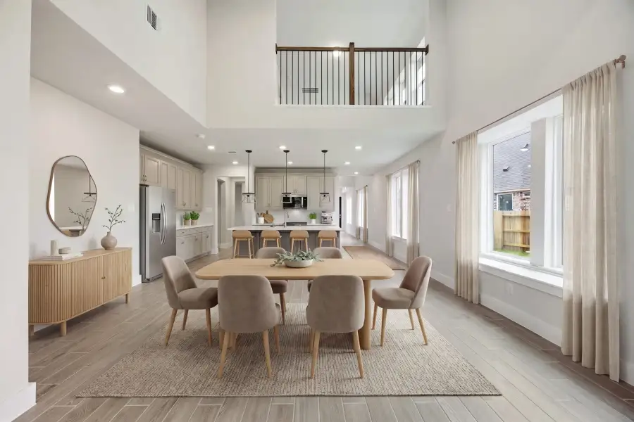 Furnished interior view inside a new home in Ellwood, Iowa Colony (Image 11).